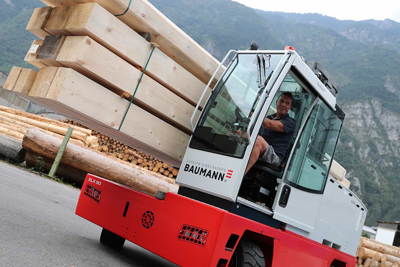 Baumann sideloader and large wooden planks