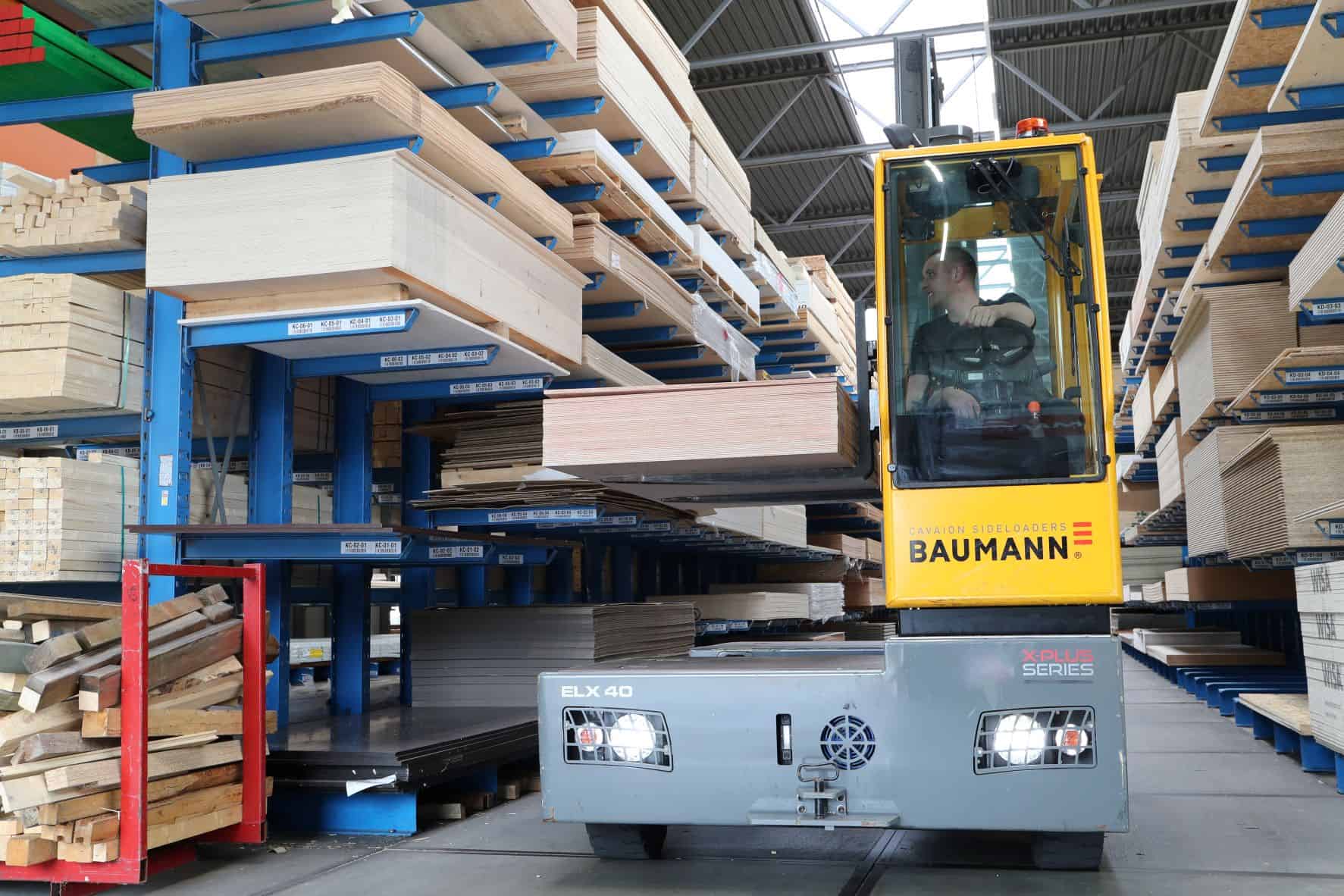 Baumann electric sideloader working in narrow aisle with cantilever racking
